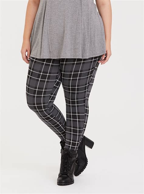 Torrid premium leggings - FIT Model is 5'8" wearing size 1. Mid rise. Tapered leg. 27" inseam. Full length. MATERIALS + CARE Nylon-blend knit fabric. 80% nylon, 20% spandex. Machine wash cold. Dry low. Imported. DETAILS Stretchy waistband. WHY WE LOVE IT With the same fit & comfort you expect from Torrid leggings, our Platinum Leggings are luxed …